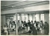 Image 6 of 8 : 1949, 9th October - cookery class - Joan Parsons-Wynne is on the left, nearest the doors