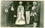 Image 2 of 4: LtoR: The Grand Inquisitor (Mary Hopkins-Jones), Casilda (Joyce Scott), Luis (Patricia Hayward), Marco (Anne Carson) outside Bakewell Town Hall - July 1950
